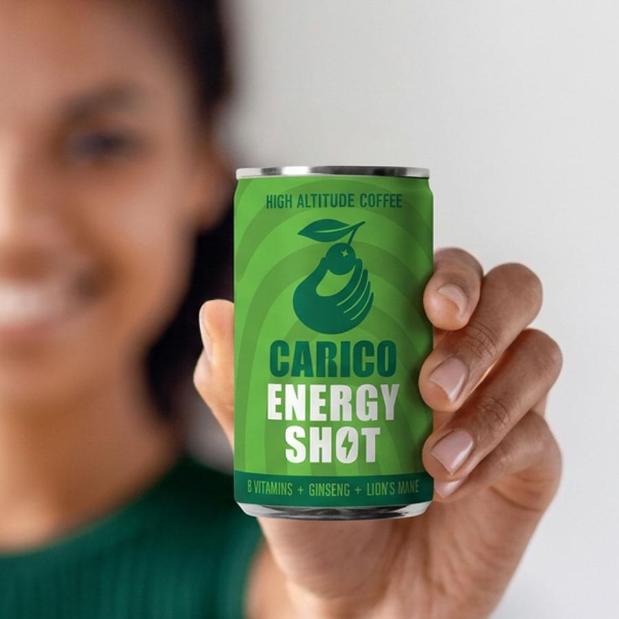 Person holding a Carico Energy Shot can